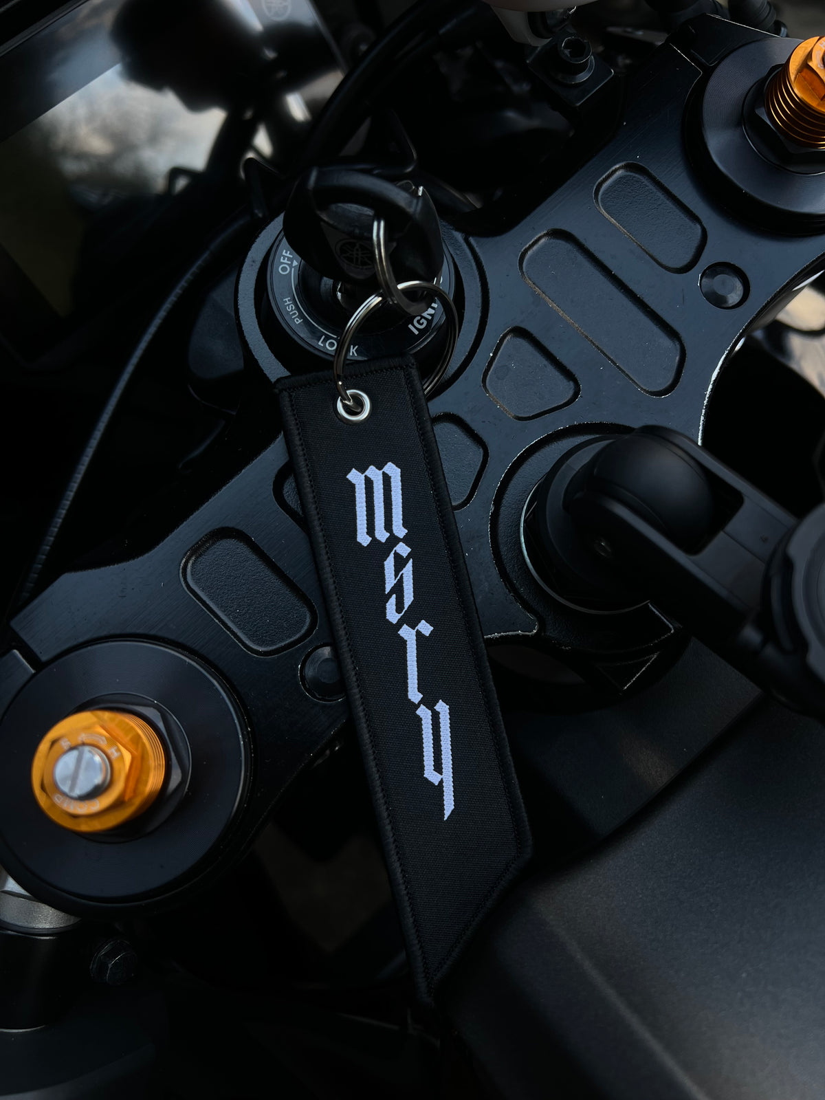 MSRY motorcycle-inspired key tag in black