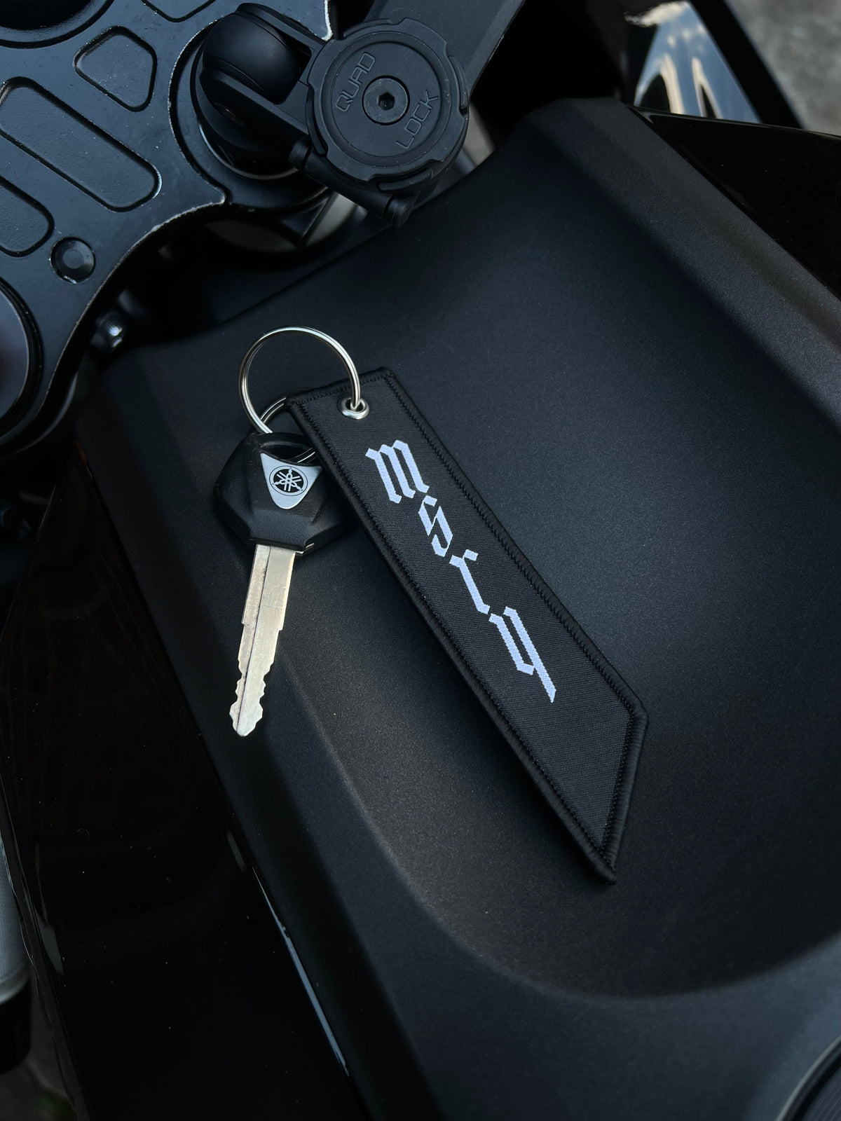 MSRY motorcycle-inspired key tag in black